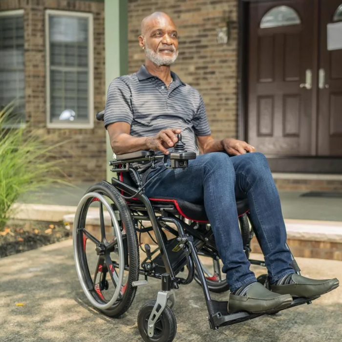 PersonOnModelHManualAndElectricWheelchair