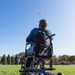 Person Enjoying His Freedom Trax FT1 Wheelchair Attachment