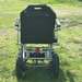Zeus Power Wheelchair Back View On Grass
