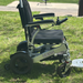 Zeus Power Wheelchair On Grass Side View