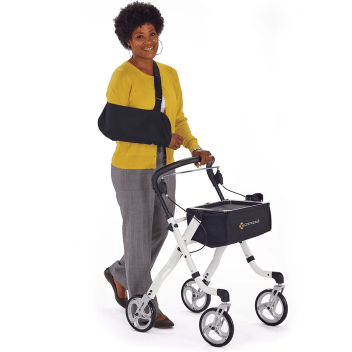 Comodita_Avanti_Rolling_Walker_yellow_shirt_woman_using_the_walker