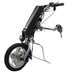 Electric wheelchair motor attachment for manual wheelchairs