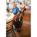 EV Rider Teqno Folding Mobility Color Red Standing Folded at the Restaurant with the old Man