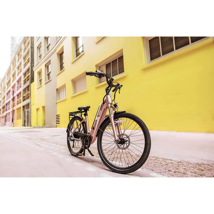 GIO Storm Electric Bike in Rose Gold with Background Picture Front View