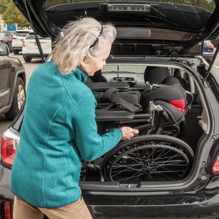 Journey So Lite Super Lightweight Folding Wheelchair Fit to Trunk by a Woman