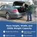 Woman loading Journey Air Elite Max folding power chair into car trunk for travel