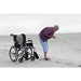 Karman_Ergo_Flight_Transport_Chair_with_Elderly_Person_in_the_Beach