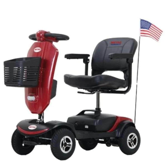 Metro Mobility USA Patriot Color Red Front Side View with Basket and USA Flag at the Back 