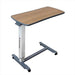 Starsleep motion Adjustable hospital bed table with wooden top and metal frame on a white background