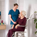 SwiftMobil-2ShowerCommodeChairCaregiverSmilingatElderlyPerson