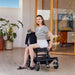 OAS Adventure Pro All-Terrain Electric Wheelchair with rider at home