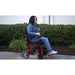 PathwayMobilityGeoCruiserEliteEXFoldablePowerWheelchairColorRedRiddingaWoman