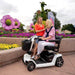 pridezeroturn10mobilityscootercolorwhite-settingawomanandtalkingafriend