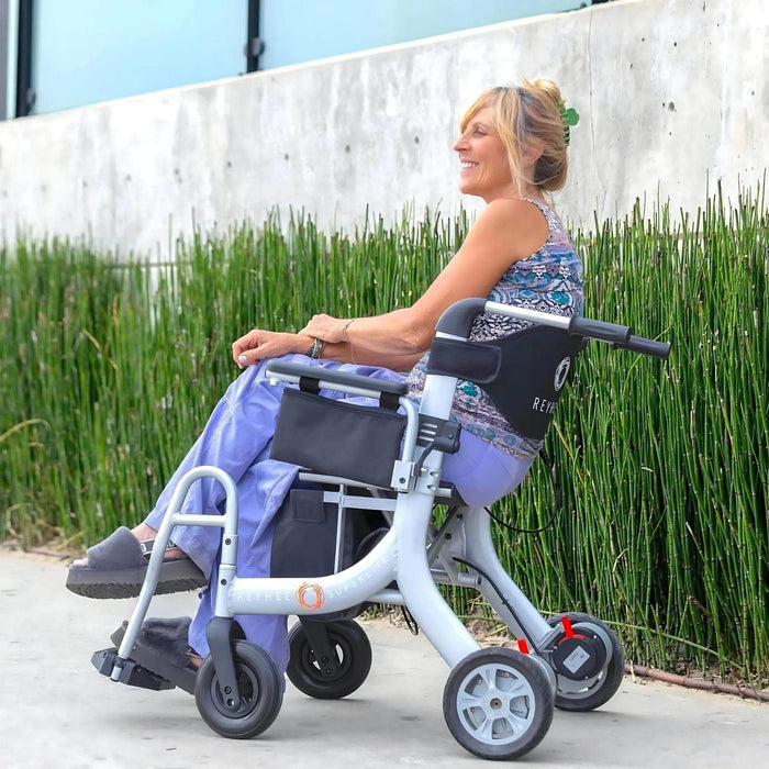 ReyheeSuperlite3in1ElectricWheelchairSideViewwithWomanSitting