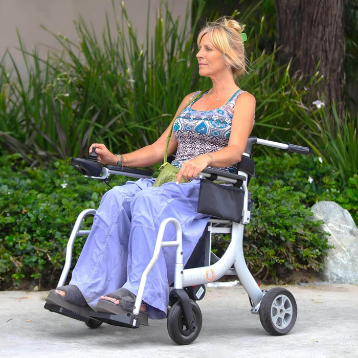 ReyheeSuperlite3in1ElectricFoldableWheelchairLeftSideViewwithWomanSitting