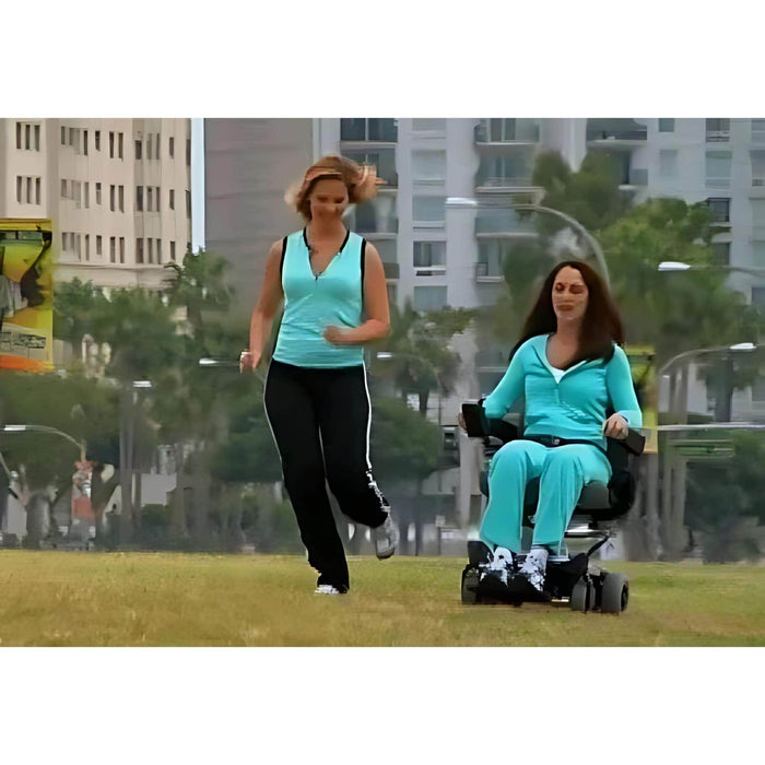 ShopRiderSmartiePowerWheelchairRidingaWomenwhilejogging