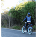 Woman_Facing_Back_Riding_Simple_Step-Thru_500W_at_the_Road_Side_View