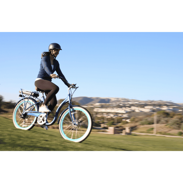 Woman_Riding_the_Simple_Step-Thru_500W_Downhill_at_Grassy_Open_Field