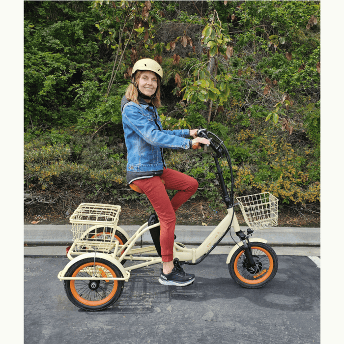 Elderly_Woman_Riding_in_Easy_Transit_750W_Folding_Electric_Trike_on_the_Street