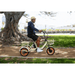 Man_Riding_in_Easy_Transit_750W_Folding_Electric_Trike_on_the_Street_2