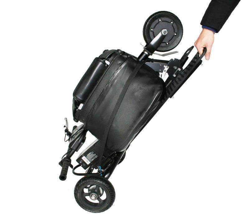 SnapNGo scooter folded up with securing strap for easy transport