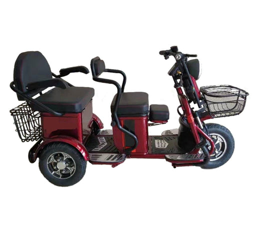 Red Pushpak 2000 two person scooter woth front and rear cargo baskets,  and chrome foot placement holders